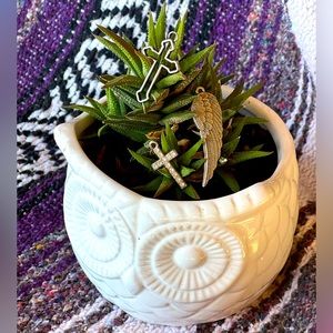 Bundle of Three charms. Two crosses, and one angel wing.